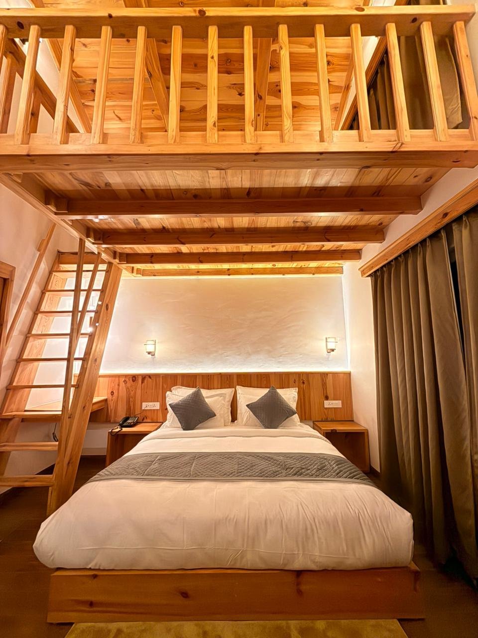 Living area with comfortable seating at Pear Meadows Tangmarg